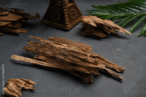 Close UpShot Of Sticks Of Oudh On Black Background 