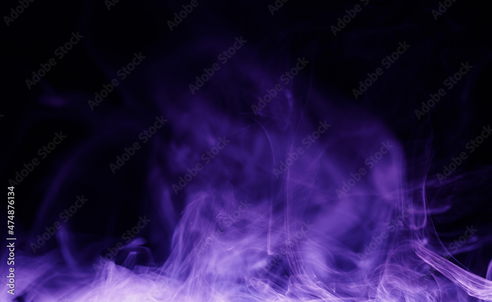Abstract purple smoke moves on black background. Beautiful swirling violet smoke. Neon light.
