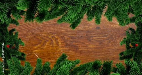 Directly above view of green pine needles on wooden table