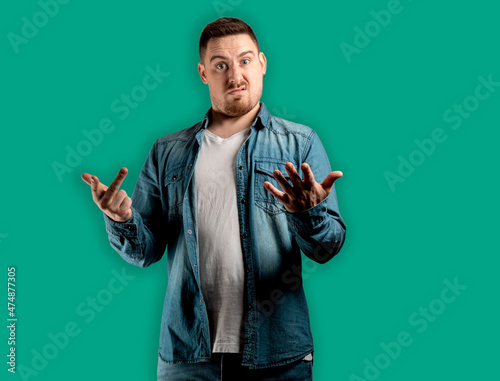 Man showing middle finger while gesturing rudely