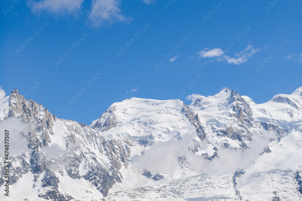 The close-up on Mont Blanc du Tacul and Mont Maudit in Europe, France, the Alps, towards Chamonix, in summer, on a sunny day.