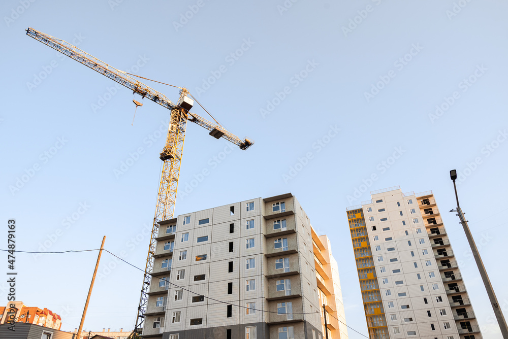 House under construction construction site and construction crane