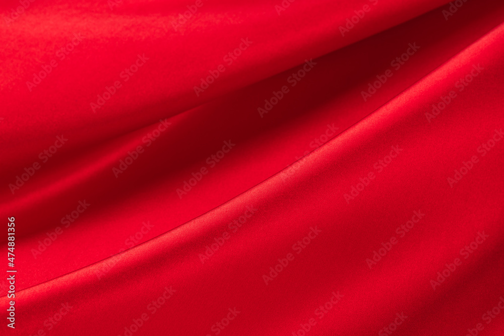 draped red silk fabric of satin weave, texture, background