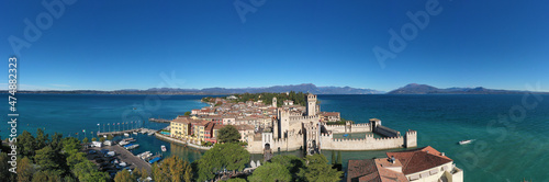 Sirmione aerial view. Autumn in Sirmione. Top view, historic center of the Sirmione peninsula, lake garda. Lake Garda, Sirmione, Italy. Aerial panorama of Sirmione.