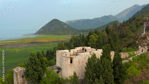 Besac fortress in mountains above Virpazar, Montenegro. Aerial view. photo