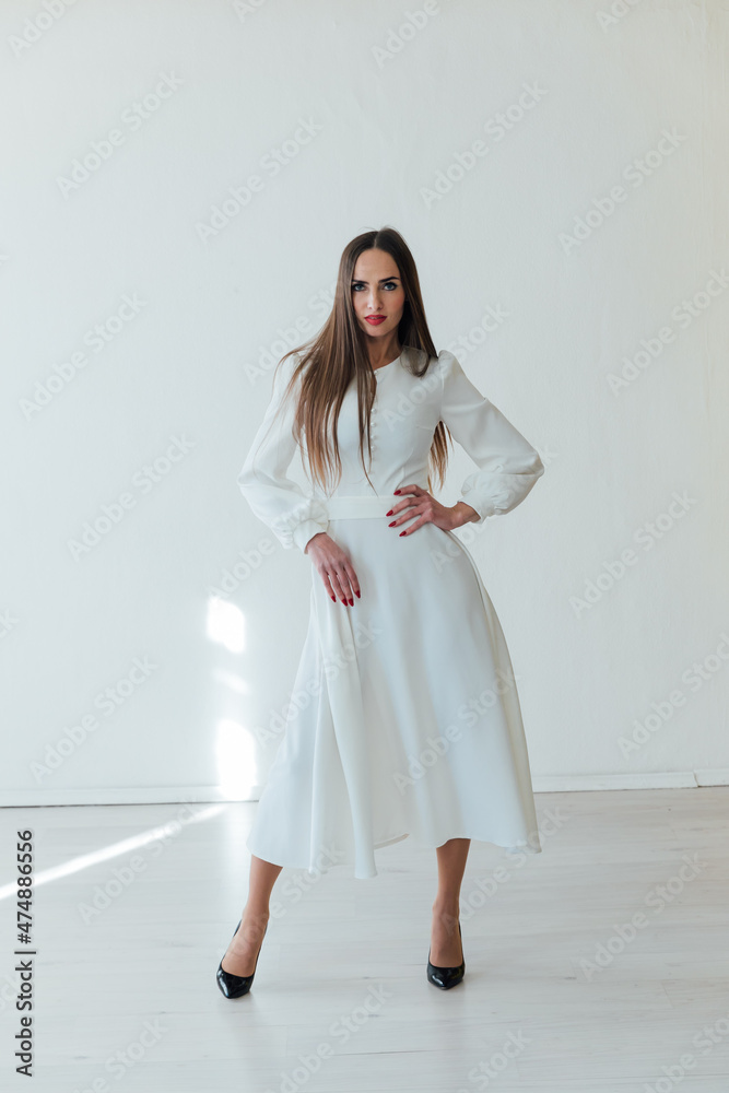 portrait of a beautiful woman in a white light dress portrait of a beautiful woman in a white light dress