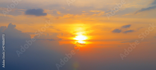 Bright sunrise over the horizon. Wide photo. © alinamd