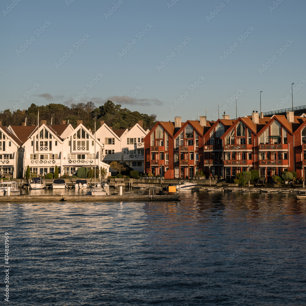 Scenic cityscape of modern norwegian town. Modern architecture of Stavanger near fjord. Sunny day.