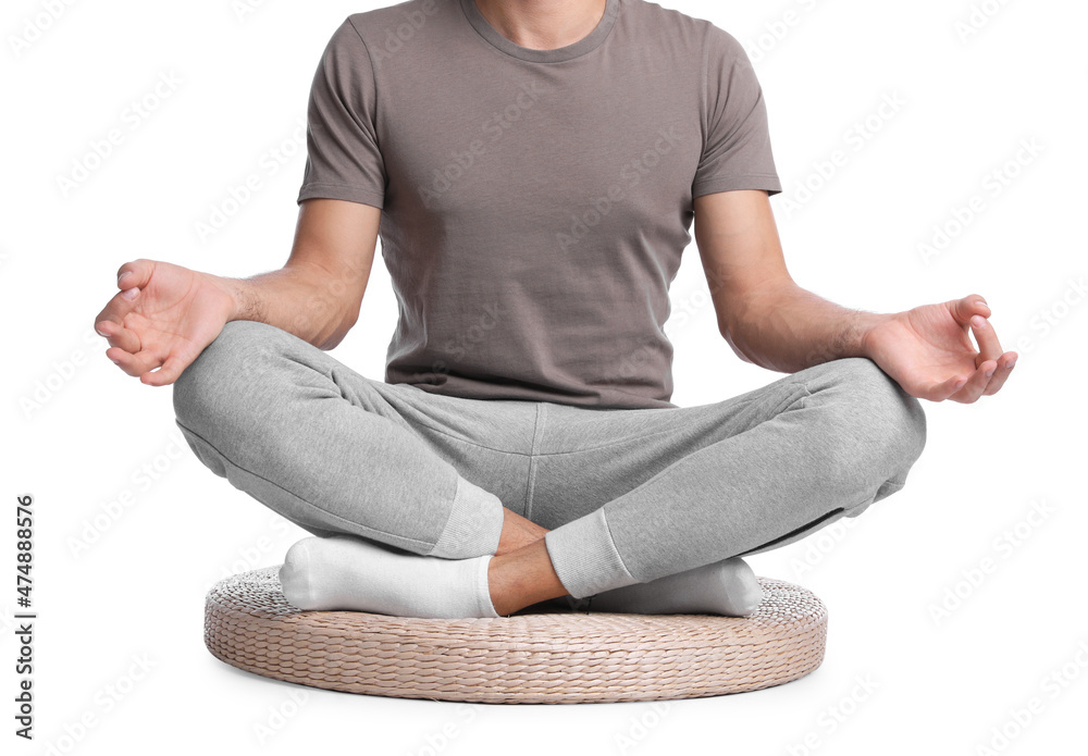 Man meditating on white background, closeup. Harmony and zen