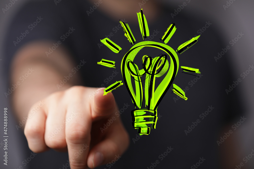 hand holding eco light bulb energy concept hand holding eco light bulb energy concept