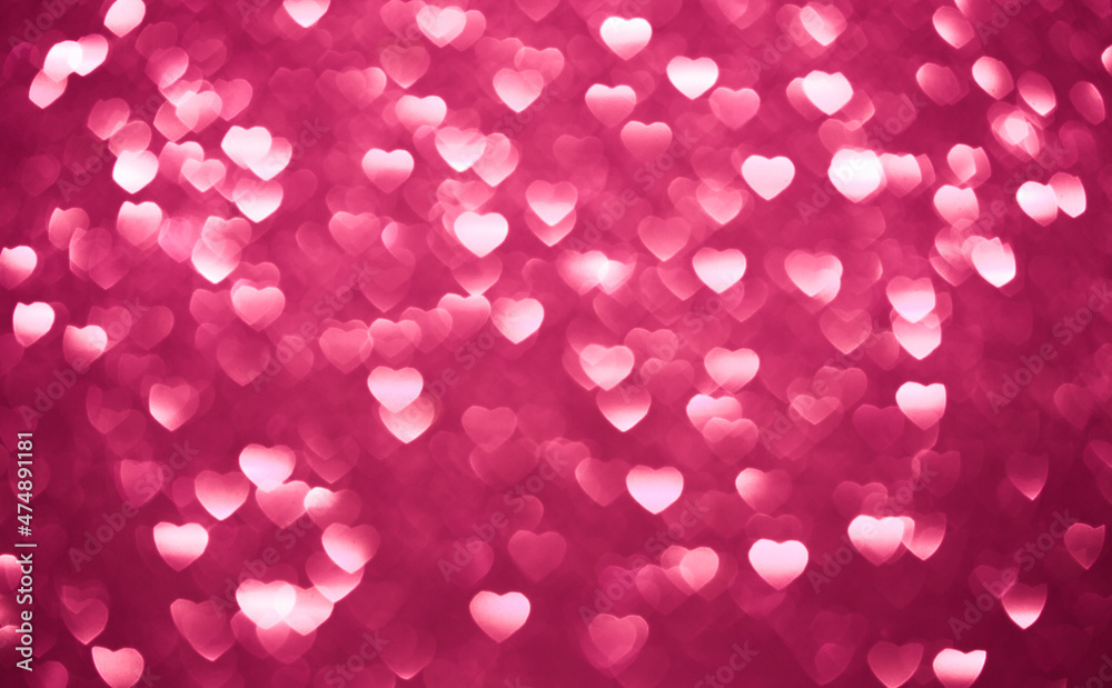 Background bokeh in the form of hearts of red and pink color. Copy space for text. The concept of romance and love. Valentine's Day. Shiny texture background. Festive background. Background bokeh in the form of hearts of red and pink color. Copy space for text. The concept of romance and love. Valentine's Day. Shiny texture background. Festive background.