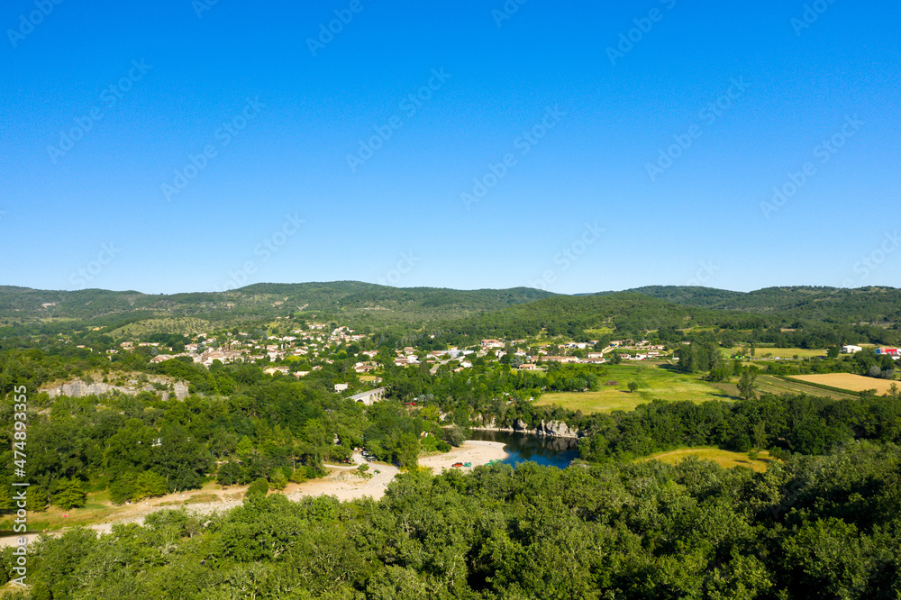 The Gorges de lArdeche amidst the green countryside in Europe, France, Ardeche, in summer, on a sunny day.