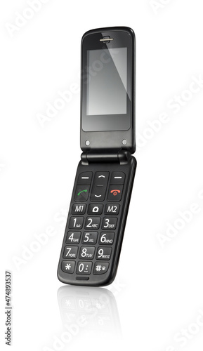 Three quarter view of simple black flip cellphone, isolated
