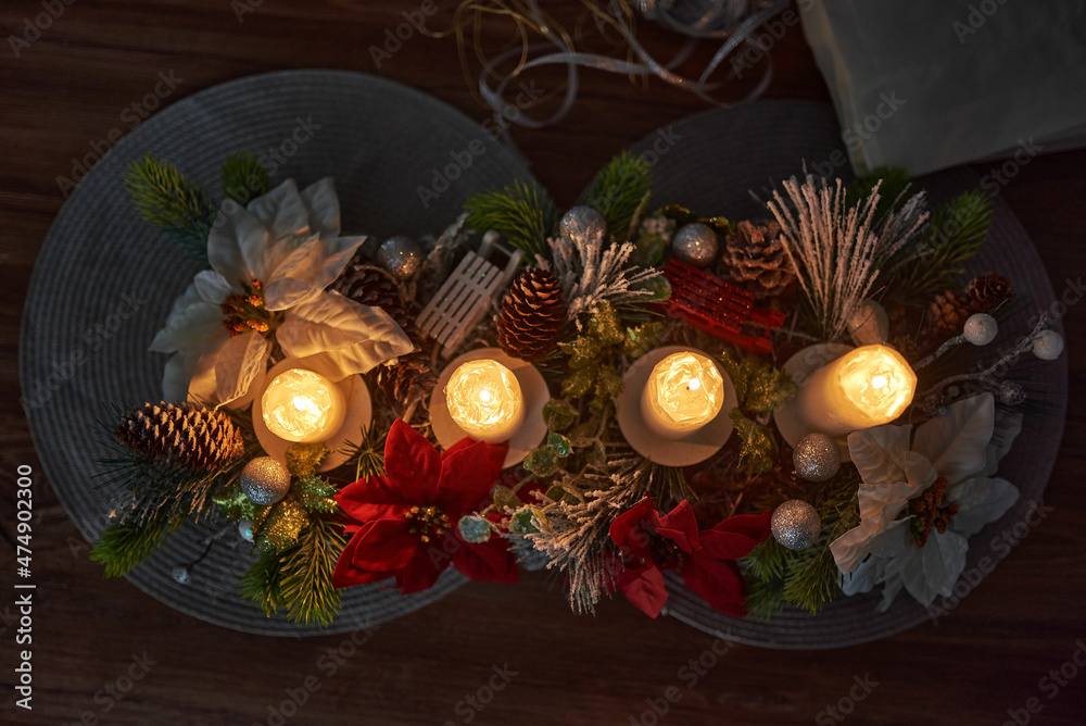 Naklejka premium a few festive candles are lit on the coffee table