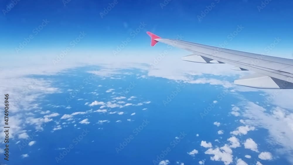 flight. wing of the aircraft in flight from the window of the aircraft above ground. air travel. comfort and speed of travel by plane. promotions and discounts on tickets. flight. wing of the aircraft in flight from the window of the aircraft above ground. air travel. comfort and speed of travel by plane. promotions and discounts on tickets.