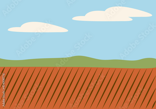 Paisaje de campos de cultivo y montaña.