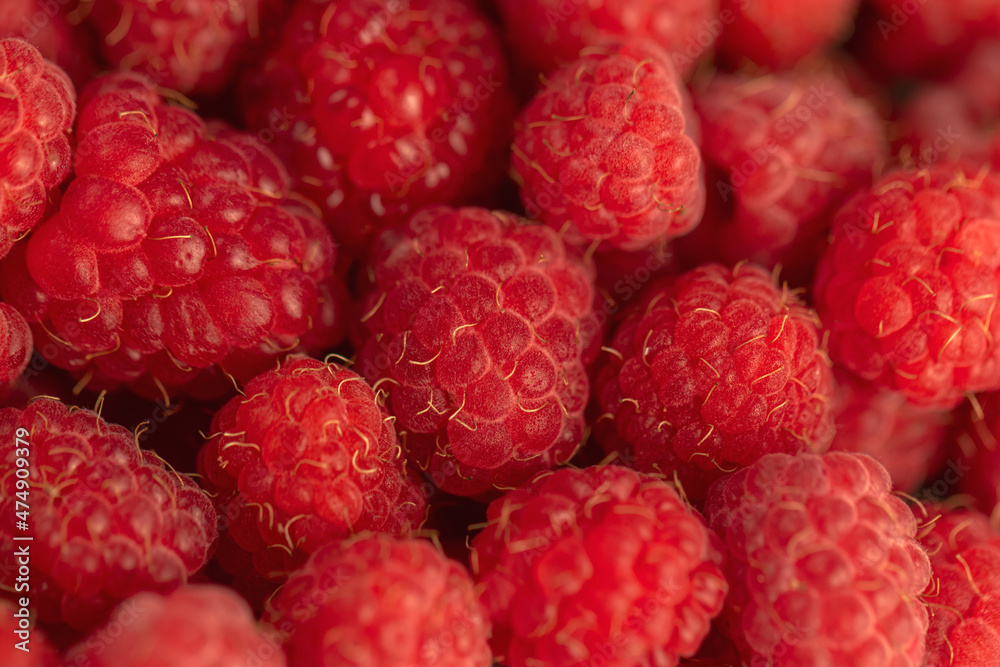 Ripe red raspberries on a plate. Ripe red raspberries on a plate.