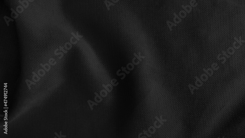close up creased dark black shiny silk fabric texture use as background with space for design. abstract smooth elegant black fabric texture. soft satin silk background with flowing waves.