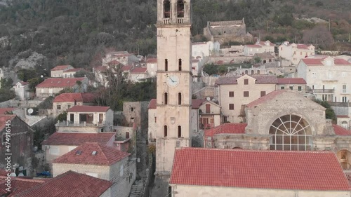 Close-up of the clock tower in Perast, camera movement up