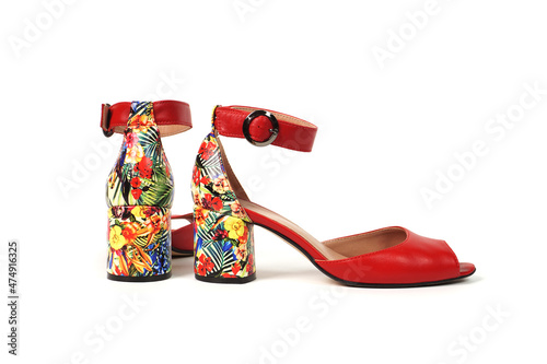 A pair of summer women's high-heeled shoes with floral print