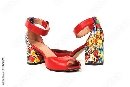 A pair of summer women's high-heeled shoes with floral print