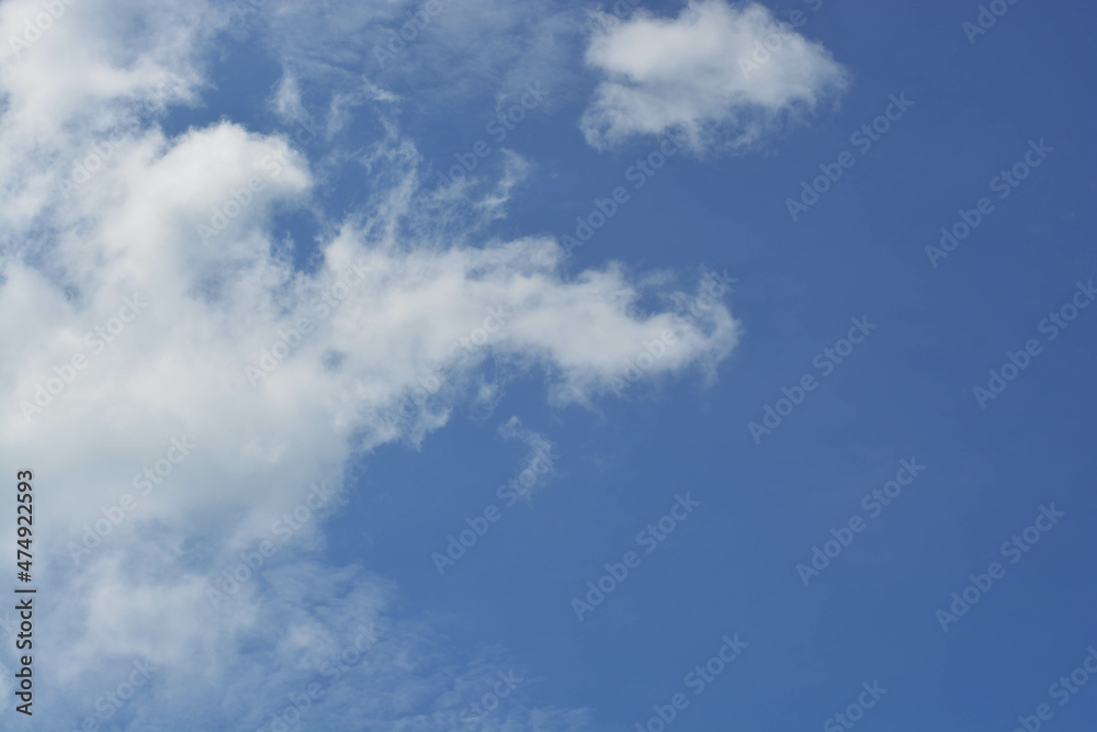 Fototapeta premium Cotton stratocumulus clouds with clear blue sky background at Trat, Thailand. No focus.