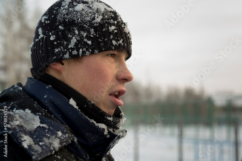 Portrait of a builder in a black knitted and blue winter jacket © ads861
