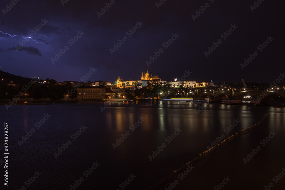 Night view of Prague Castle and Charles Bridge during a rainstorm - Prague, Czech Republic Night view of Prague Castle and Charles Bridge during a rainstorm - Prague, Czech Republic