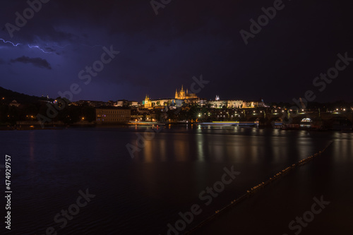 Night view of Prague Castle and Charles Bridge during a rainstorm - Prague, Czech Republic © Bernard Barroso