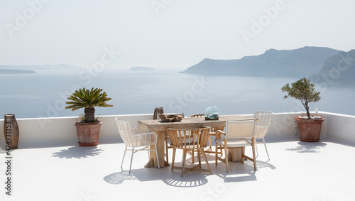 Summer terrace with stylish trendy outdoor furniture at a luxurious travel destination.