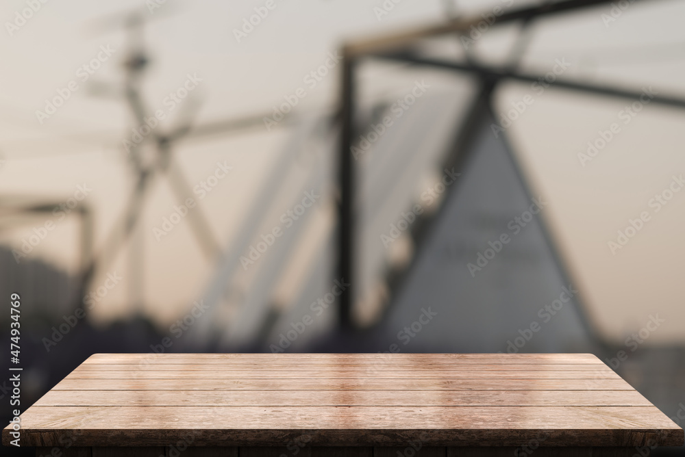 Empty wooden table top with lights bokeh on blur restaurant background. Empty wooden table top with lights bokeh on blur restaurant background.