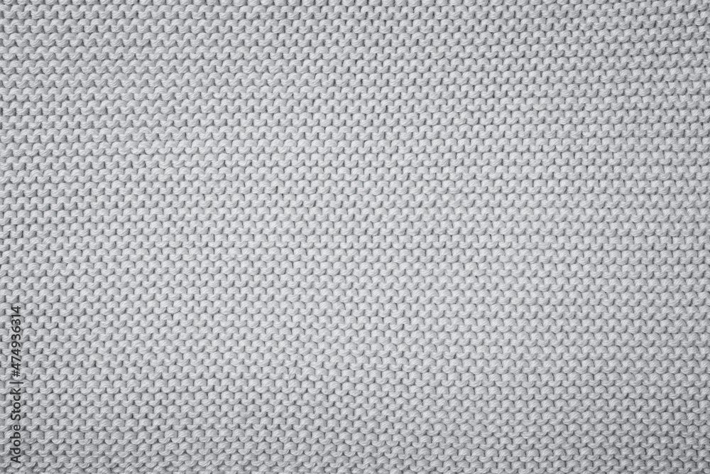 Knitted wool background. Grey texture knitted wool sweater Knitted wool background. Grey texture knitted wool sweater