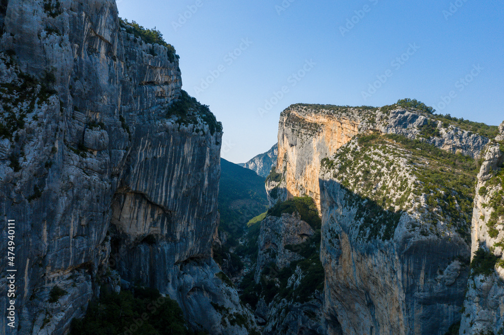The narrow cliffs in the Gorges du Verdon in Europe, France, Provence Alpes Cote dAzur, in the Var, in the summer on a sunny day. The narrow cliffs in the Gorges du Verdon in Europe, France, Provence Alpes Cote dAzur, in the Var, in the summer on a sunny day.