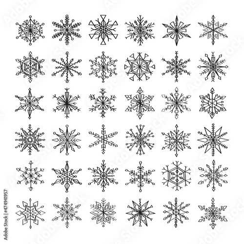 Collection of monochrome illustrations of snowflakes in sketch style. Hand drawings in art ink style. Black and white graphics.