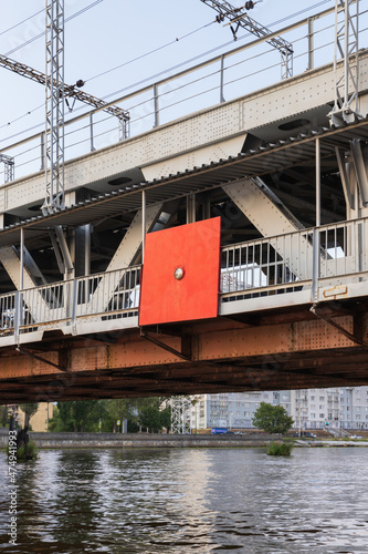 Red navigation sign, bridge span indication