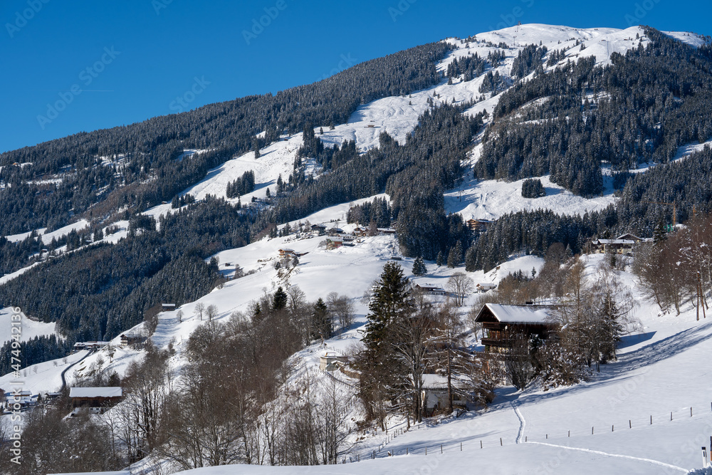 beautiful view of the snow capped hohe tauern in austria at a sunny winter day beautiful view of the snow capped hohe tauern in austria at a sunny winter day