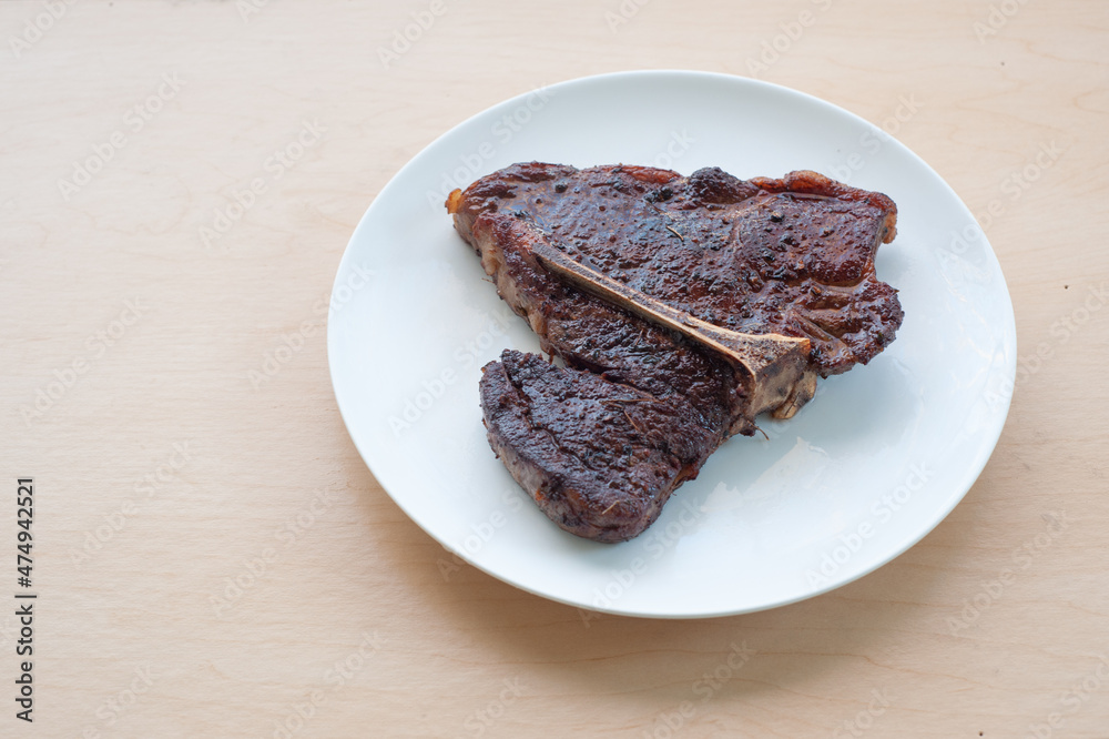 cooked Porterhouse steak cooked Porterhouse steak