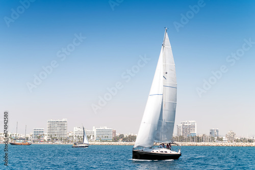 Yacht sailing at Larnaca bay. Cyprus
