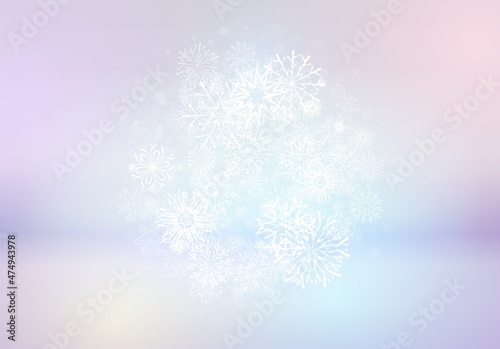 Christmas card with snowflakes falling on soft blurred background. Xmas or winter holidays greetings card with snowfall and glowing backdrop.