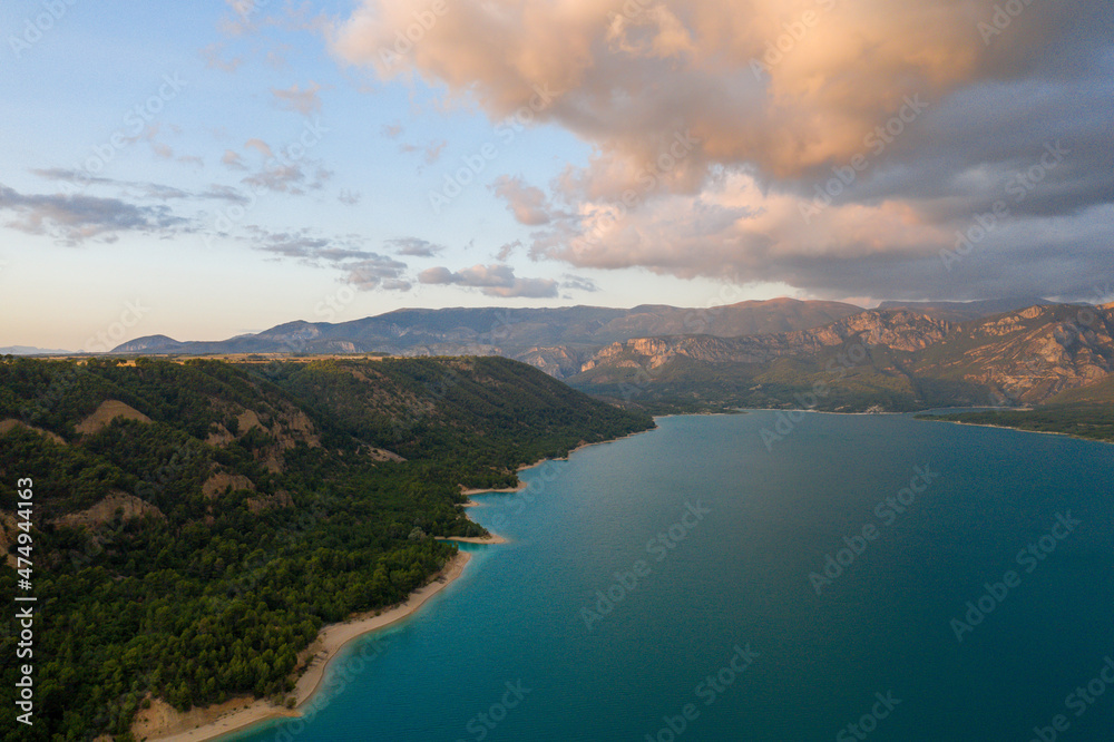 The Lac de Sainte-Croix and its green forests in Europe, France, Provence Alpes Cote dAzur, Var, in summer, on a sunny day.