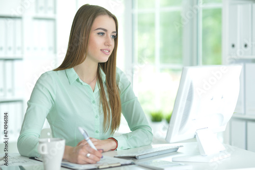 Portrait of businesswoman working in office