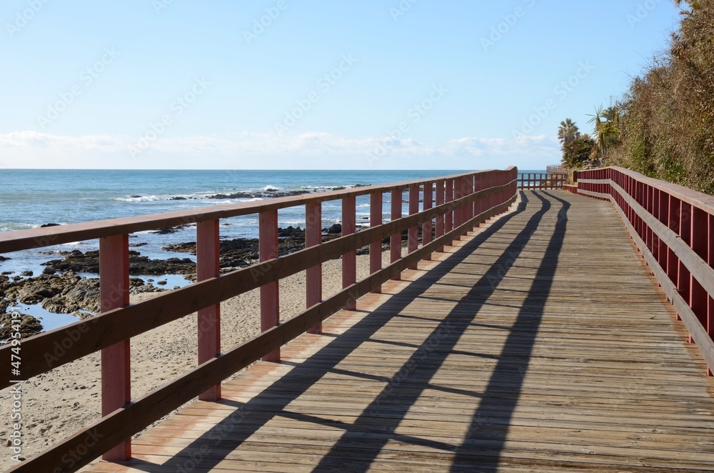 Footpath along the sea in Mijas beach, Malaga, Spain. Footpath along the sea in Mijas beach, Malaga, Spain.