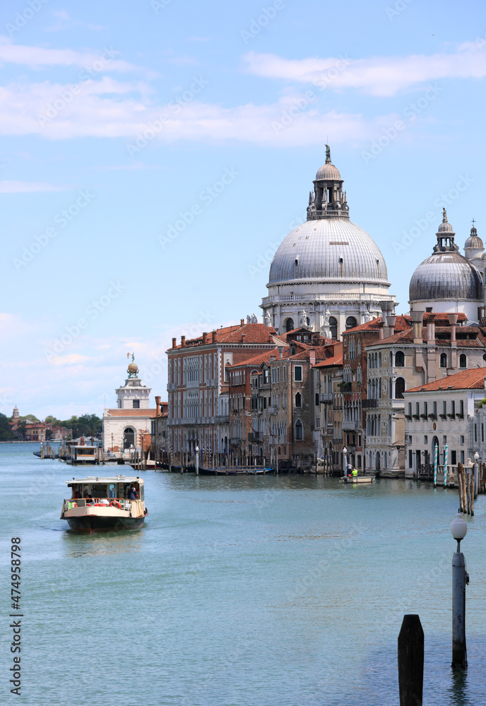 Water bus called Vaporetto in the Grand Canal of Venice in Italy