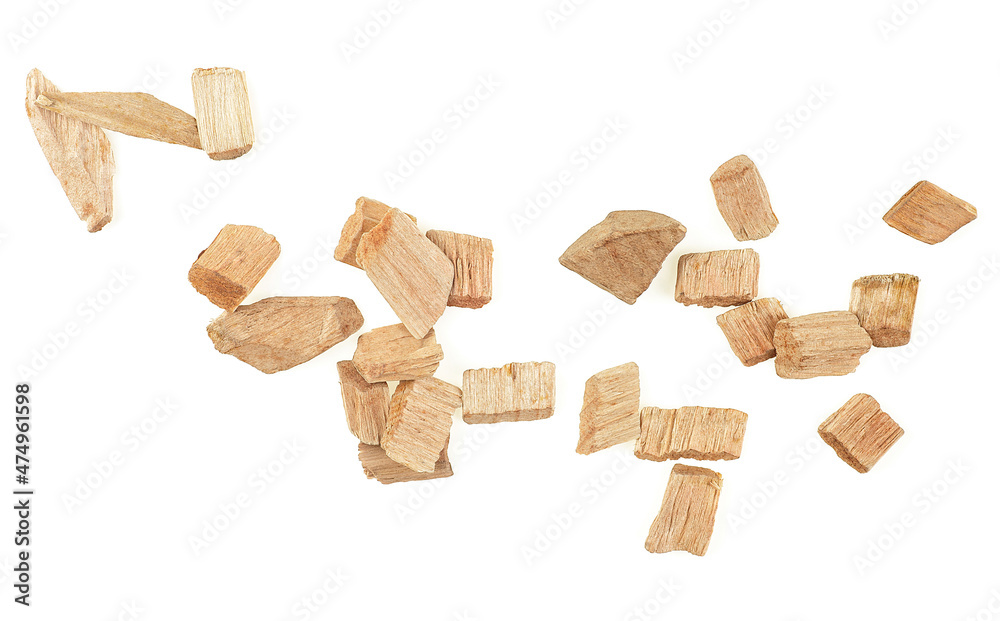 Wood chips isolated on a white background, top view. Wood smoking chips. Wood chips isolated on a white background, top view. Wood smoking chips.