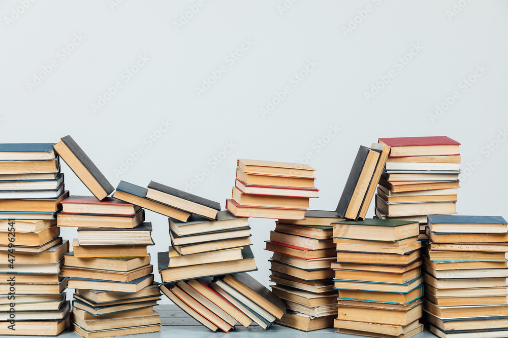 Stacks of books for teaching knowledge library university school white background Stacks of books for teaching knowledge library university school white background