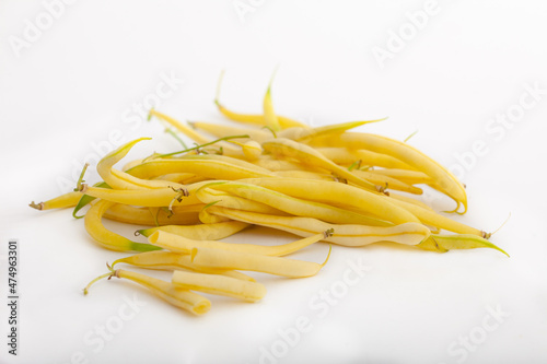 Obraz na plátne Yellow string beans on white background