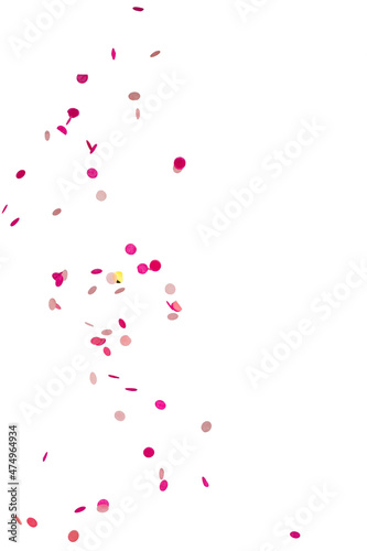 round multicolored confetti made of paper and foil isolated on a black and white background