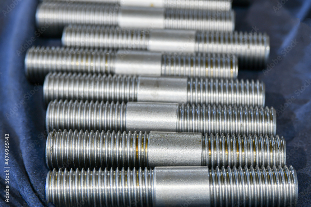 Double-sided studs with metric thread cut with a cutter on a lathe. Double-sided studs with metric thread cut with a cutter on a lathe.