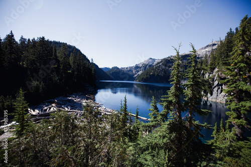Landscape picture of a lake in a valley taken in the middle of summer in the Pacific Northwest