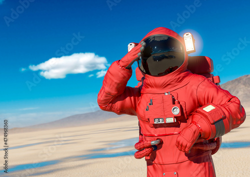 astronaut is thinking about in the desert of another planet after rain © DM7